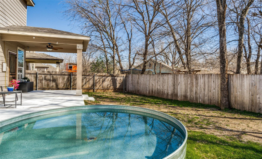 Professionally installed cowboy pool adds peace to this quaint yard! 