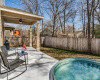 Large patio is perfect for enjoying the beautiful shaded yard!
