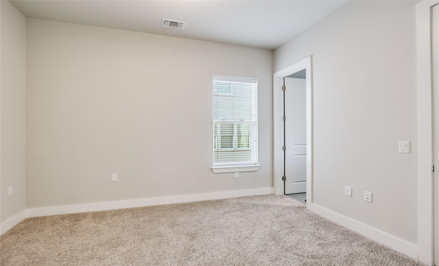 Upper Level Living Space -This is a great flex space, there is also a Bedroom and full bathroom on this level.