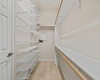 The large walk-in closet completed the ensuite.