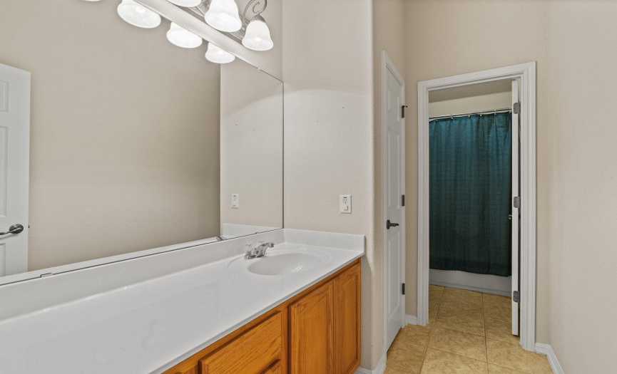 The second full bath provides a separate water room, allowing two people to get ready at once.