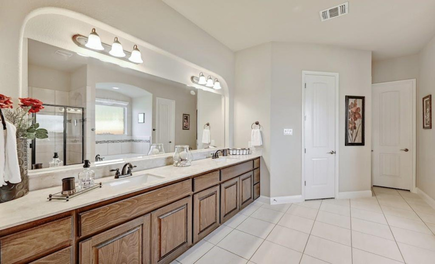 The main bathroom is a dream ~ very spacious ~ His and Hers walk-in closets ~ Garden tub and separate shower