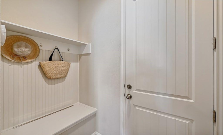 This storage area is at the entrance from the garage to help you keep organized!