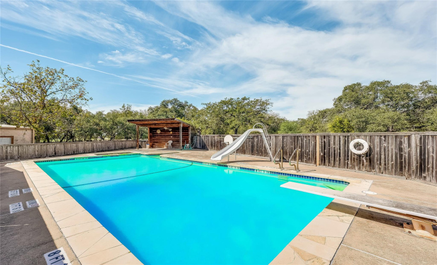Large pool with cabana and fenced.
