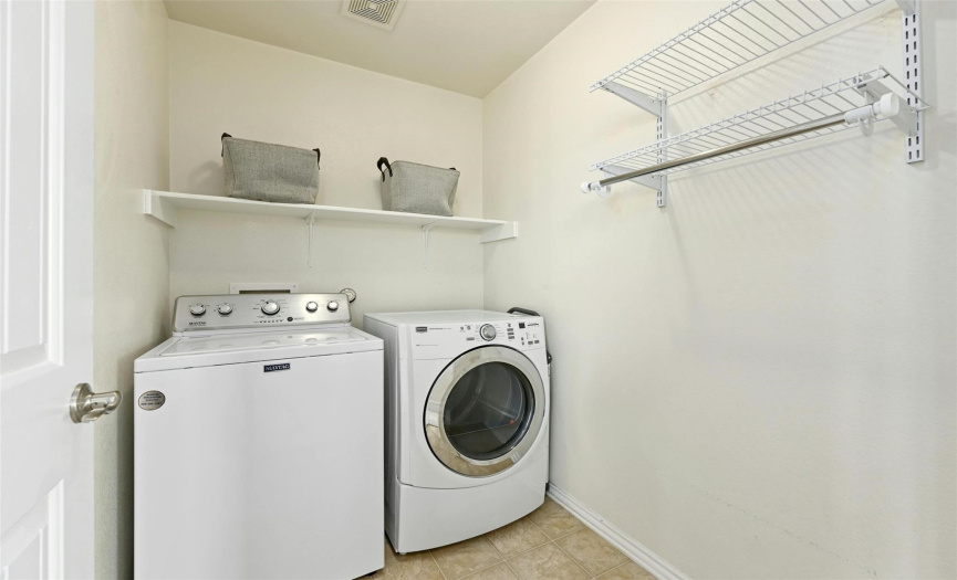 Super convenient, in-home laundry room located upstairs off the sitting room, in between the primary suite and secondary bedroom hallway. 