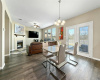 Featuring a luminous open floor plan for the living room, kitchen, and dining area. 