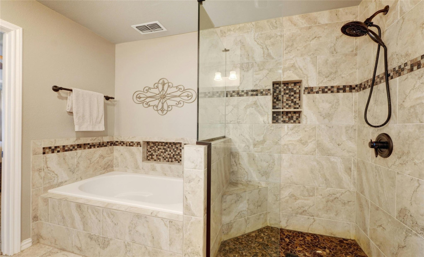 Relax in the Jetta 40 gallon insulated soaking tub that maintains your heated water while bathing. Built in niches in bath tub area and walk-in shower.