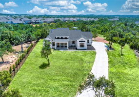 Spectacular Custom Luxury Home nestled in the Premier Hill Country Community of Bunker Ranch Acres in Dripping Springs.