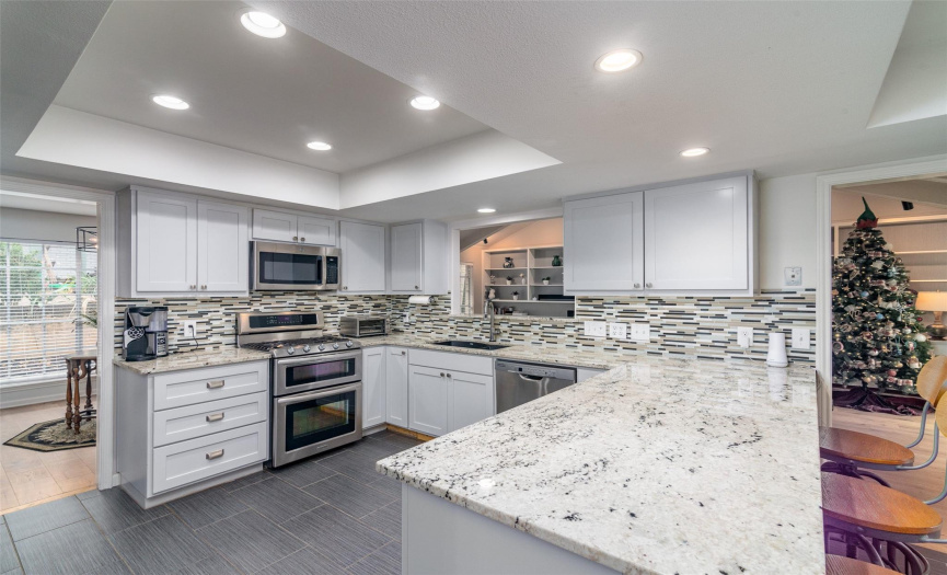 Stainless Steel Appliances and Granite Countertops in Kitchen