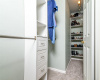 Master Closet with Shelves and Drawers