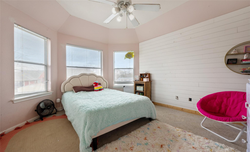 Upstairs bedroom has lots of natural light.