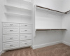 Primary Walk-in Closet with built-ins.
