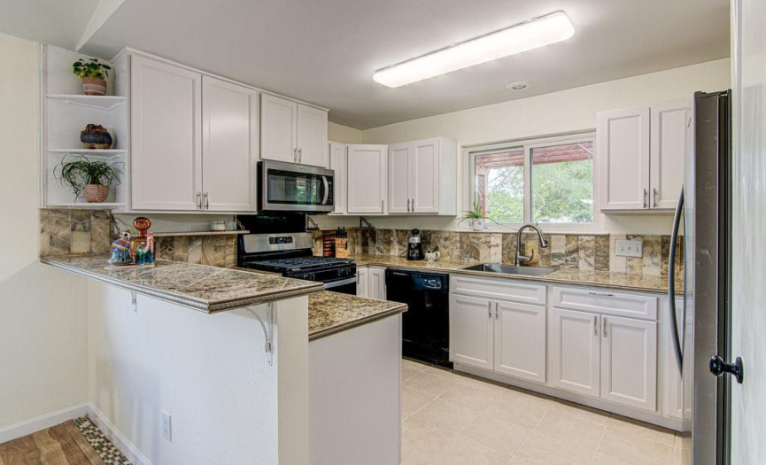 Classic U shaped kitchen with plenty of counter top space. 