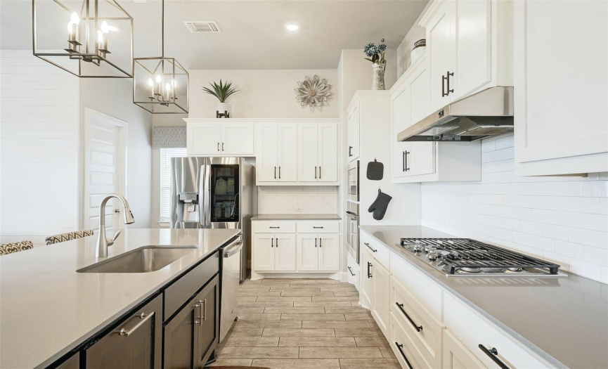 The home chef will love the desirable built-in stainless steel appliances, including a gas range!