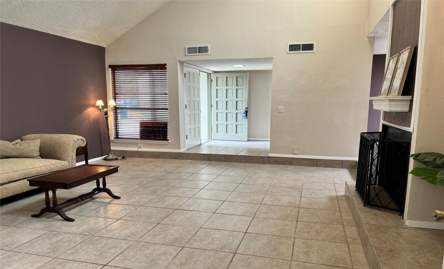hard-tile flooring, updated interior 2-tone paint & spacious, light and airy living area. 
