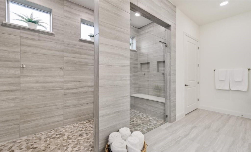 Extra inviting walk-in shower with dual shower heads - super luxurious!
