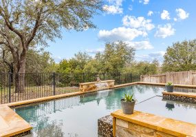 2708 Shire Ridge. Backing to a greenbelt, this gorgeous home has a pool, spa, outdoor living space, and more.