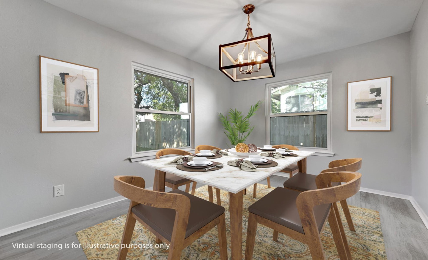 Dining room off kitchen with large dual-pane windows.