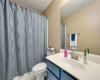 The second full bathroom has a tub/shower configuration and is between bedrooms #2 and #3.