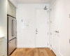charming entry with large laundry closet 