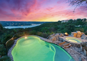 Relax in your own personal oasis with stunning, unobstructed views of Lake Travis. Enjoy a sunset from the heated inground pool complete with a flowing stone waterfall from the 5-person jacuzzi.  