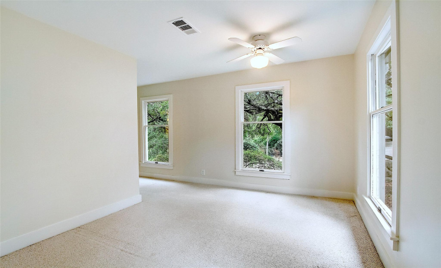 The front bedroom extends around the corner of the home giving it extra privacy.