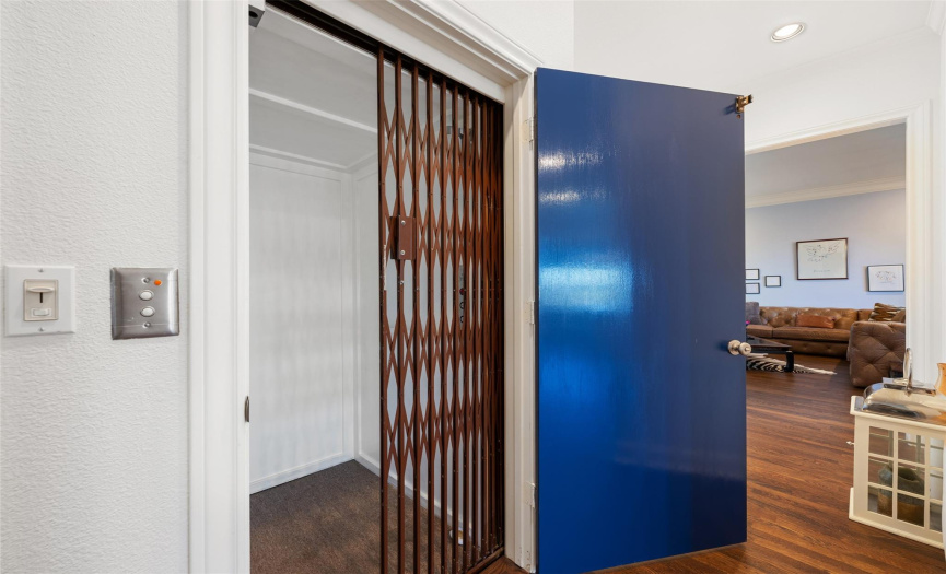 No worries about bringing groceries or other items up from the garage or lower level with this spacious elevator. 