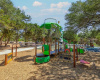 Playground for the kids! Great amenities surround this home.