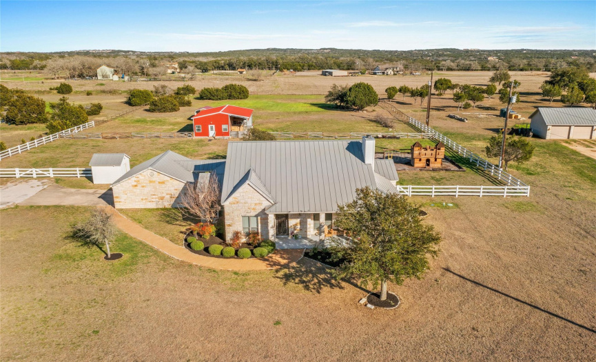 Room to roam on this 2.5+ acre property, but still an easy commute to Austin.