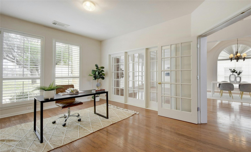 The dedicated office is filled with natural light and can easily be converted into a 4th bedroom.