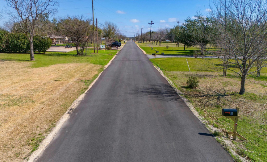 The community road was recently repaved. It makes it easy to get to all the businesses on the street.