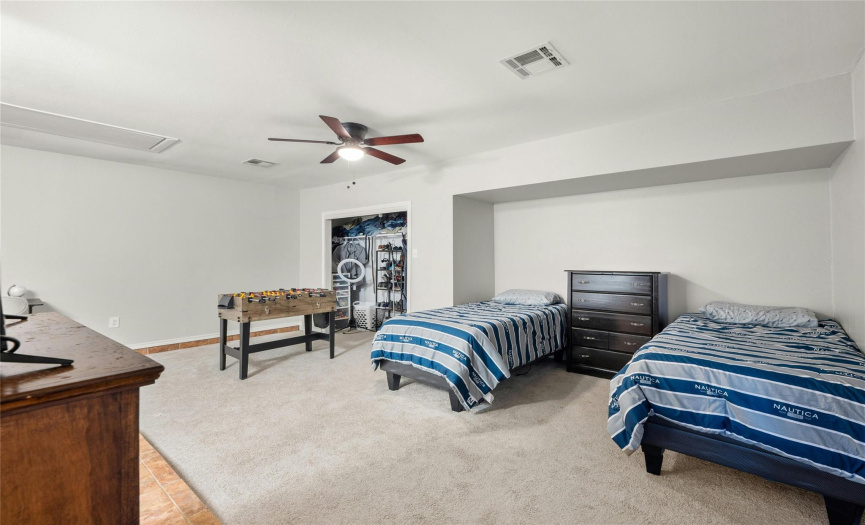 The third bedroom/game room/office is very large and could be used for a multi-generation living purpose or a private guest retreat on the other side of the home since it has a door out to the backyard.