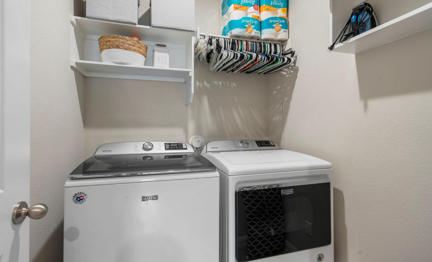 Laundry room with extra shelving/storage