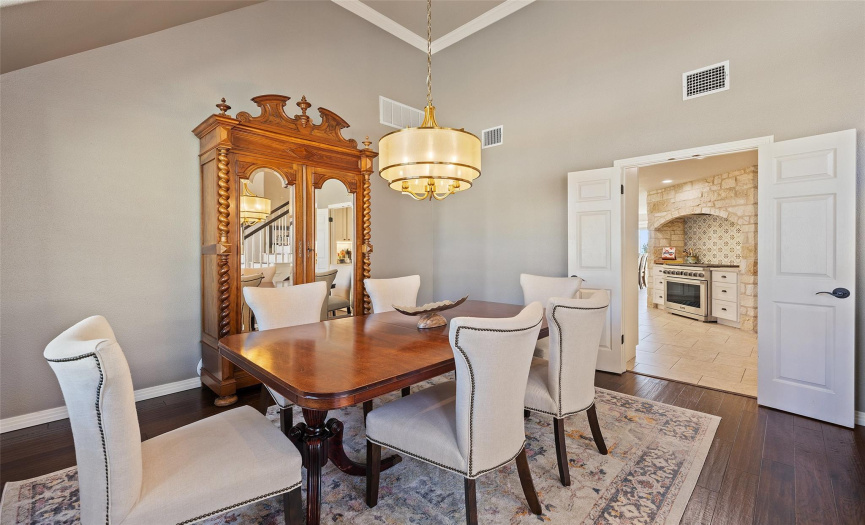The dining room connects to the kitchen for seamless entertaining.