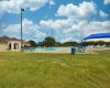 Dive into leisure at the community pool, where families gather to splash, play, and bask in the sun.