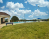 The community pool offers a refreshing oasis for residents to relax, socialize, and enjoy endless hours of aquatic fun.