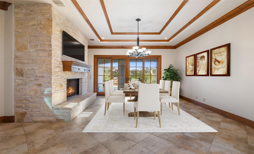 Virtually Staged formal dining with cozy fireplace, perfect for entertaining