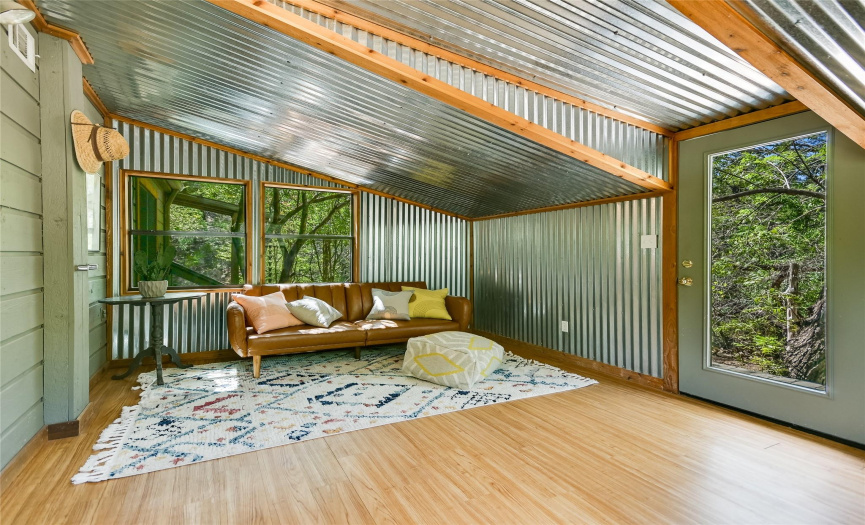 This cool space could be a bedroom, yoga studio, art studio, or whatever your needs require!