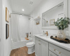 In the extra bathroom, you'll discover abundant space for your daily preparations, adorned with sophisticated accents.