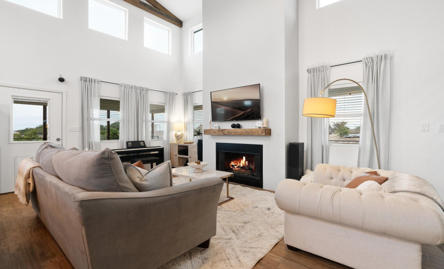 And for easy living you’ll enjoy the wood-look tile floors and a cozy gas fireplace for relaxing evenings. 