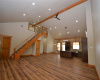 Open floor plan with high ceilings. Small loft up stairs only.