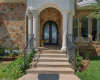 Descend the front steps to your new home at 4922 Hidden Creek Ln.
