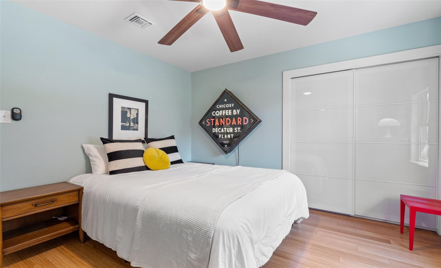 Secondary Bedroom with ceiling fan and closet space