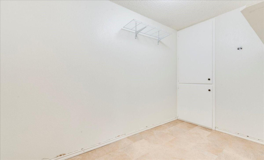 Large laundry room with space to add extra shelves / cabinetry 