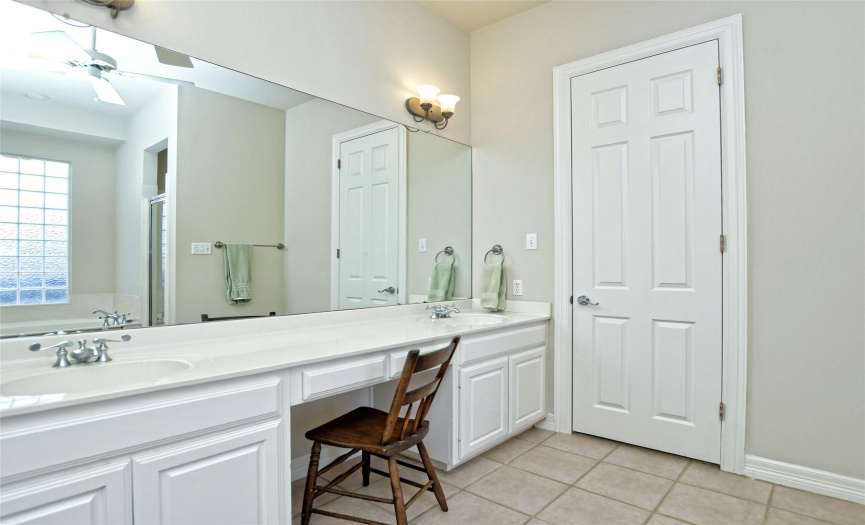Enjoy your own private ensuite bath complete with a sizable dual vanity, garden tub, separate shower, and walk-in closet. 