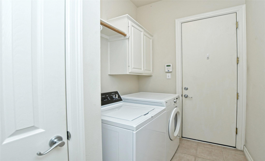 The in home laundry room is located at the garage entry. 