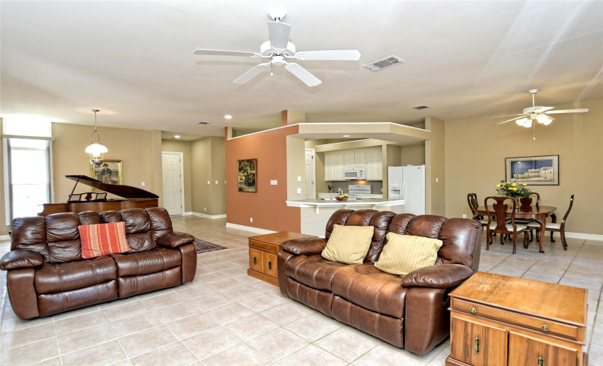 Featuring refreshing tile floors and tall ceilings throughout. 