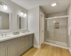 Redesigned walk-in closet space in primary bath.