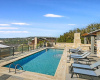the gorgeous pool is strategically located on the hillside and just below unit $78