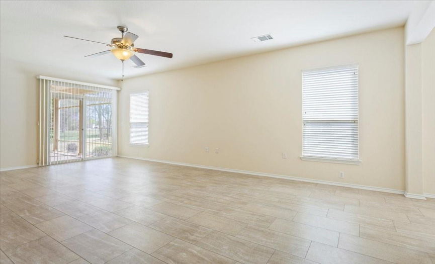 Luxury vinyl tile flooring through-out the house.  Window to the left takes you to the screened patio.